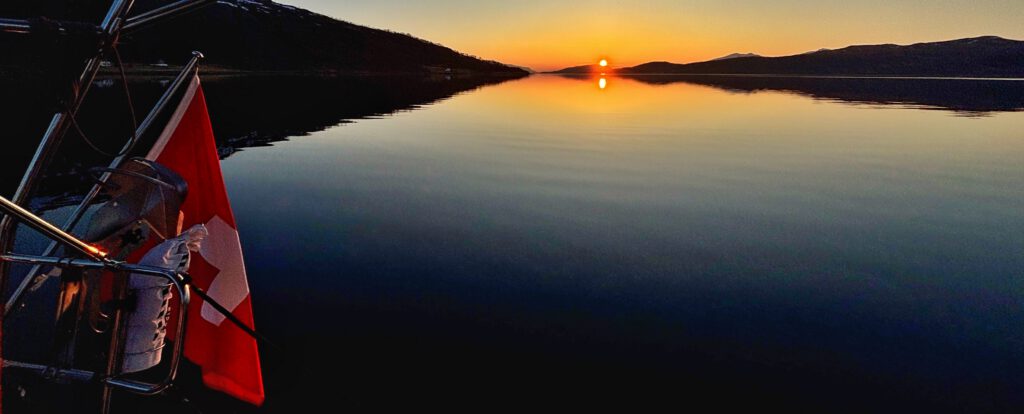 Midnight Sun in Northern Norway from the cockpit of a sailing yacht