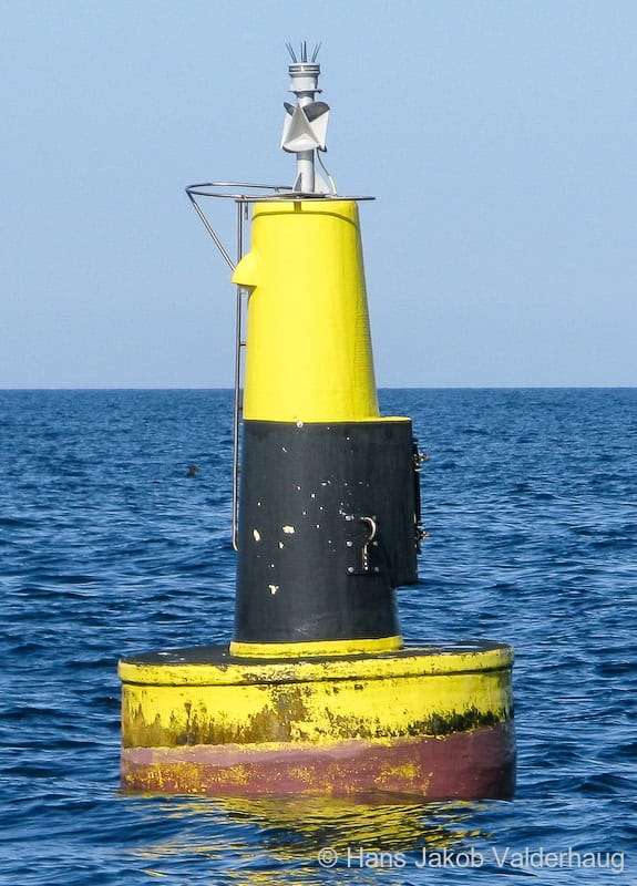 Yellow and black Cardinal Buoy - Jærens rev west in the approaches of Tananger